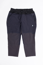 Dark gray and black pants on a white background