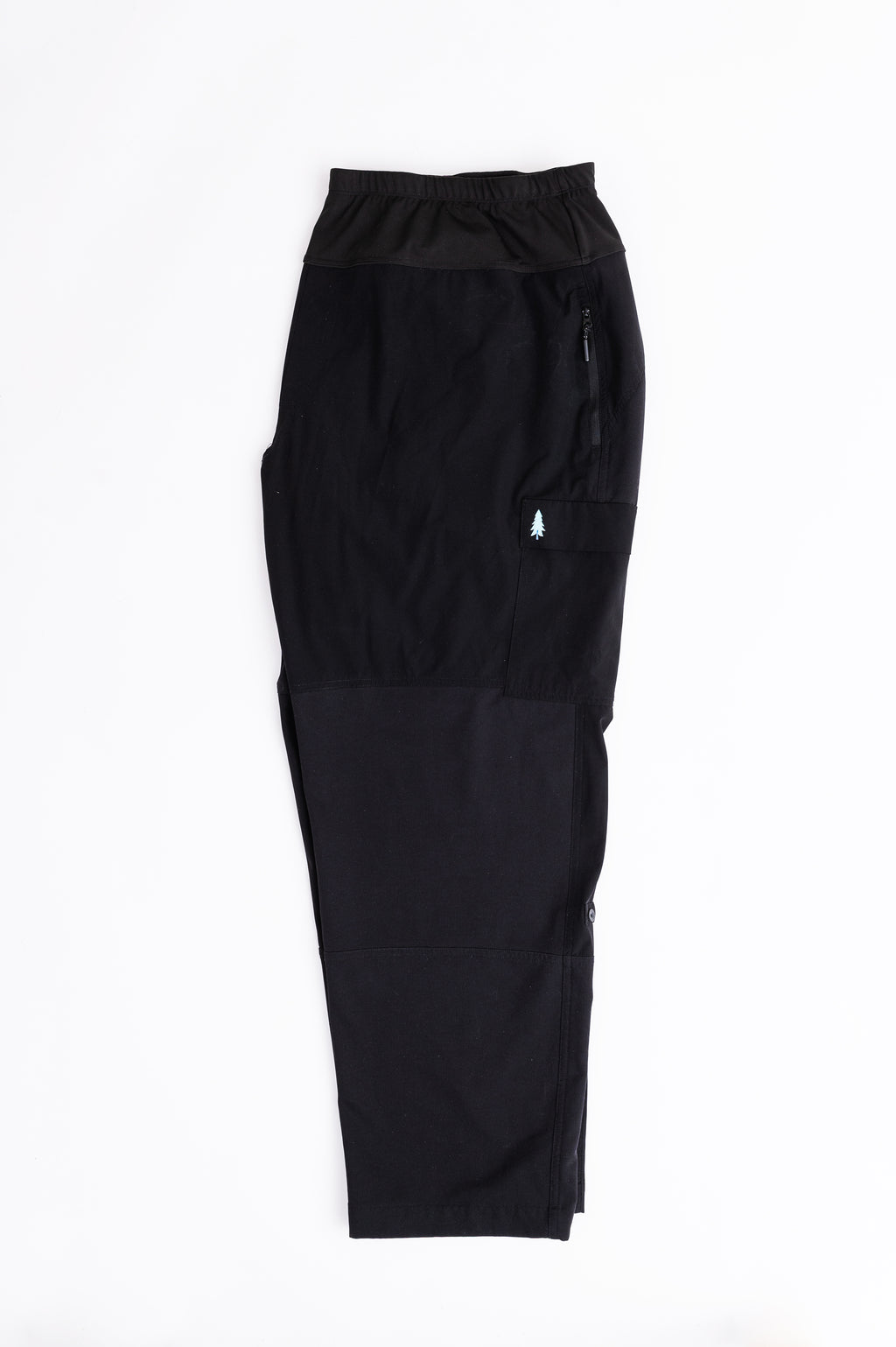 Black hiking pants with a small logo on a white background