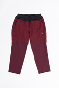 A pair of maroon plus-size hiking pants with an outer cord waistband. 