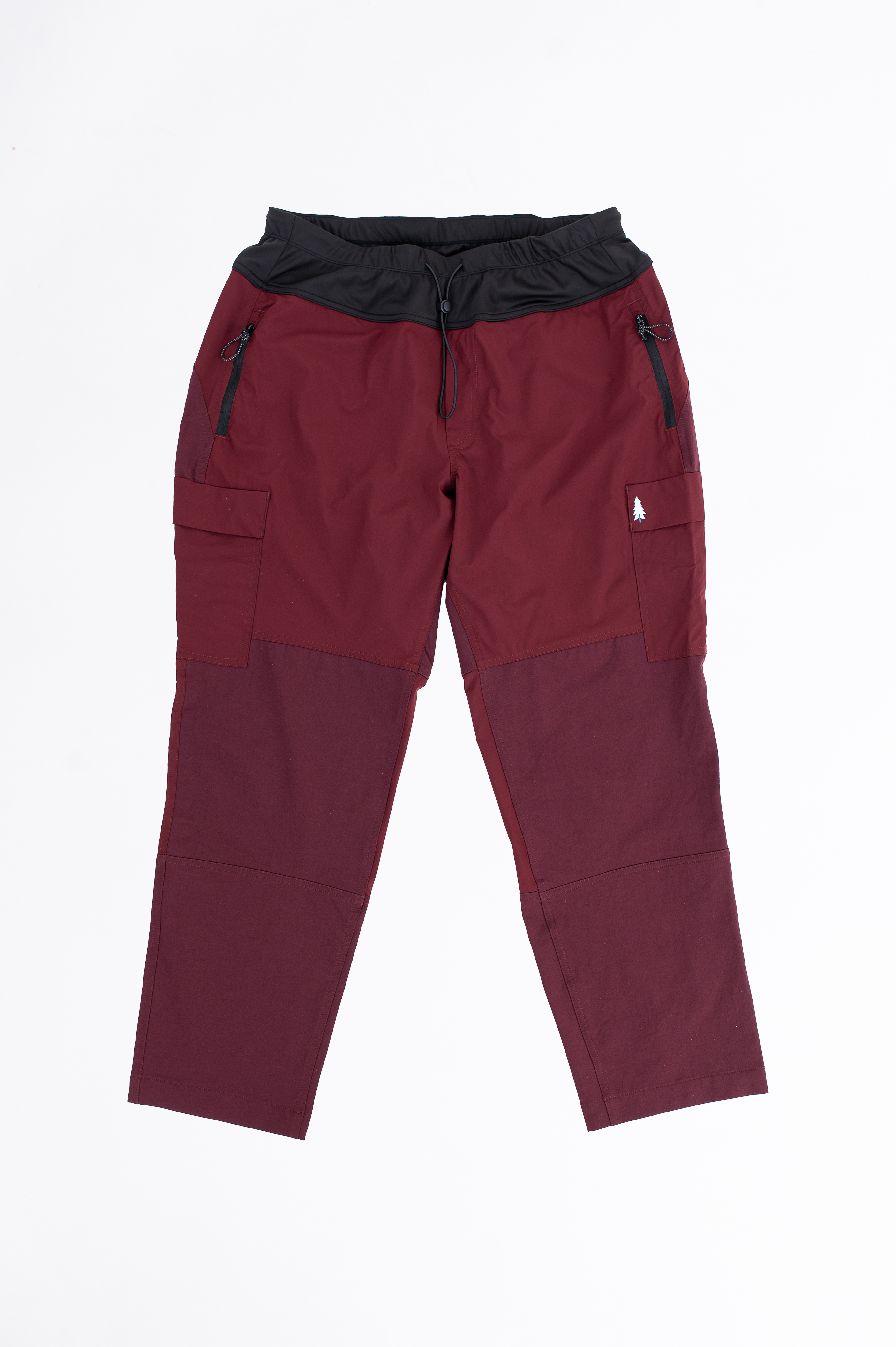 A pair of maroon plus-size hiking pants with an outer cord waistband. 