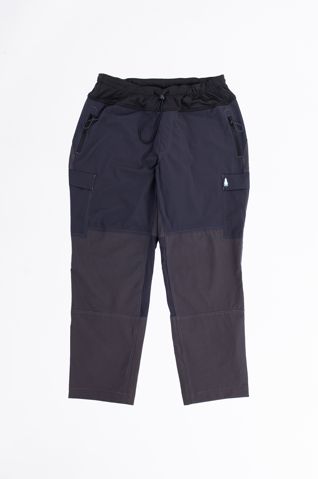 A pair of gray plus-size hiking pants with an outer cord waistband. 
