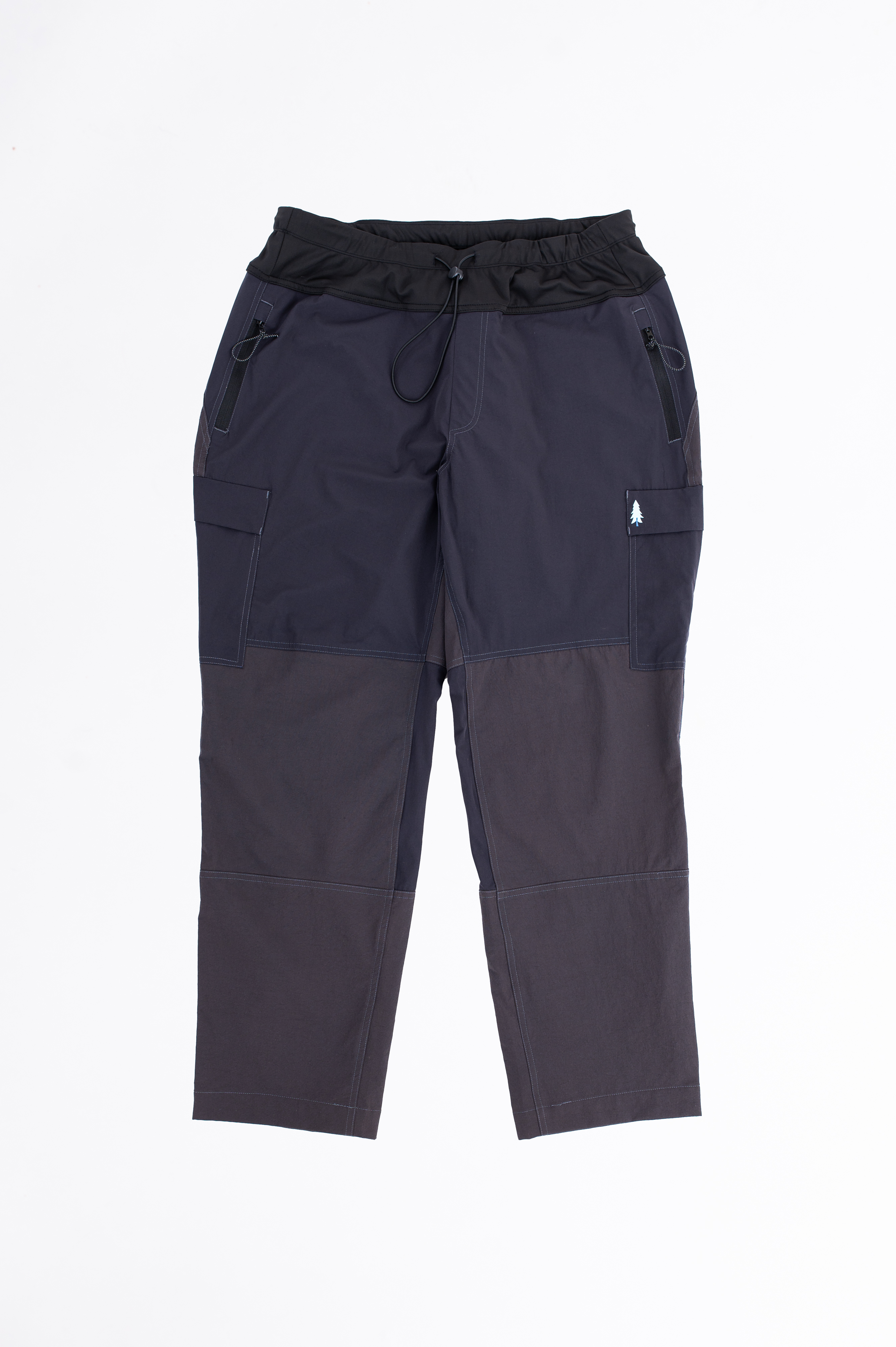 A pair of gray plus-size hiking pants with an outer cord waistband. 