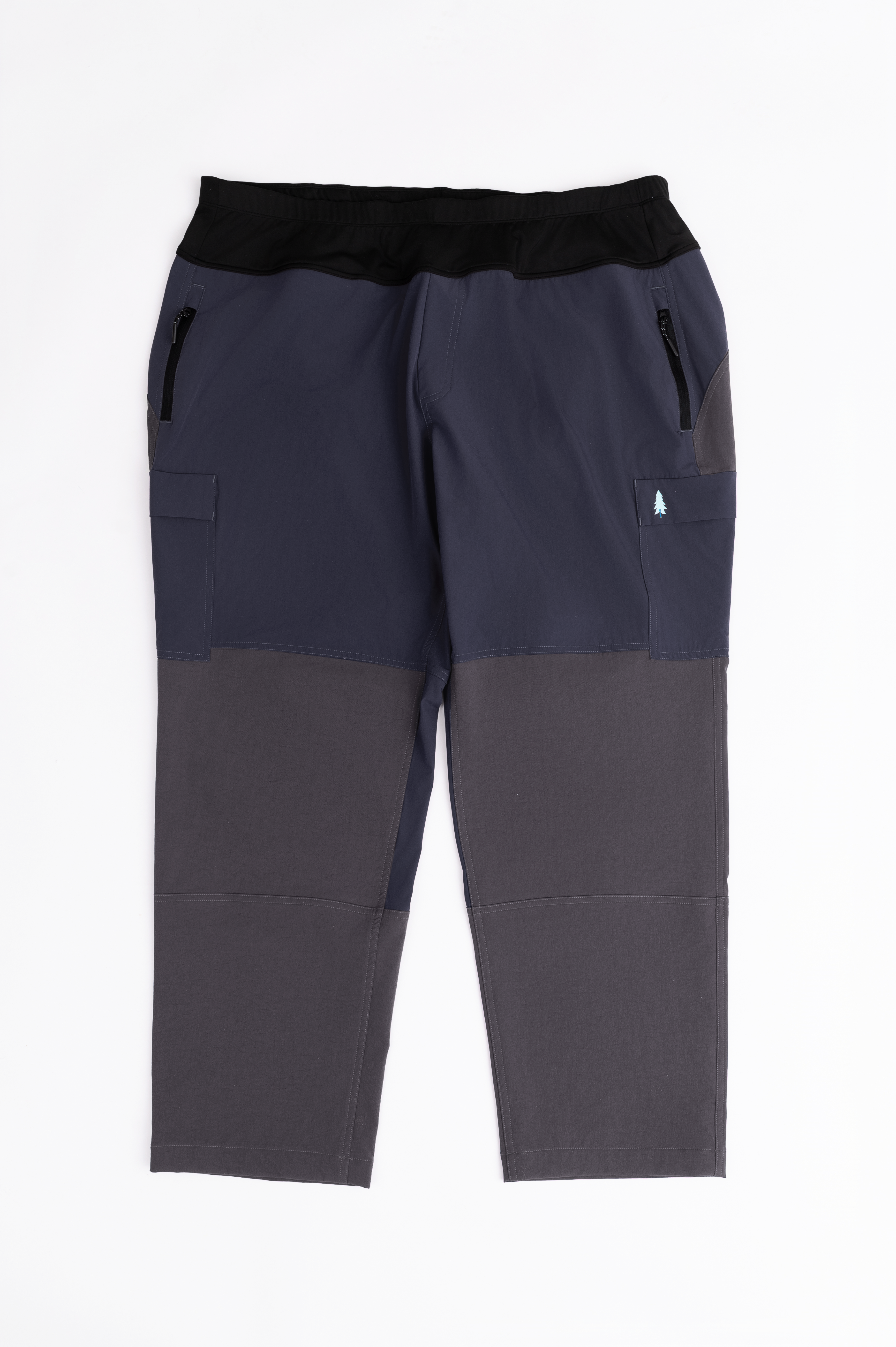 Two-tone pants with dark and light gray sections on a white background