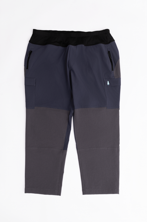 Two-tone pants with dark and light gray sections on a white background