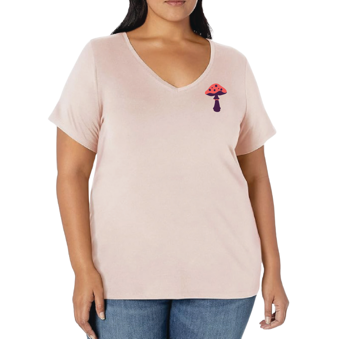Woman wearing a light pink t-shirt with a small graphic on a white background